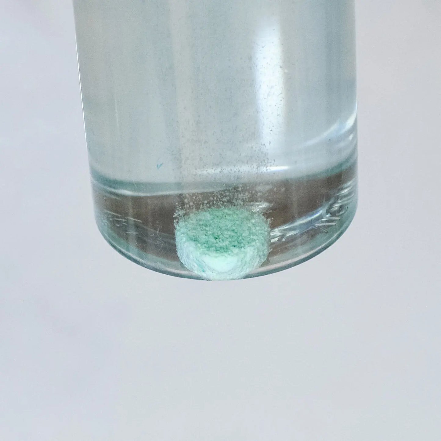 99.9% Antibacterial Multipurpose Cleaner Tablet dissolving in tap water