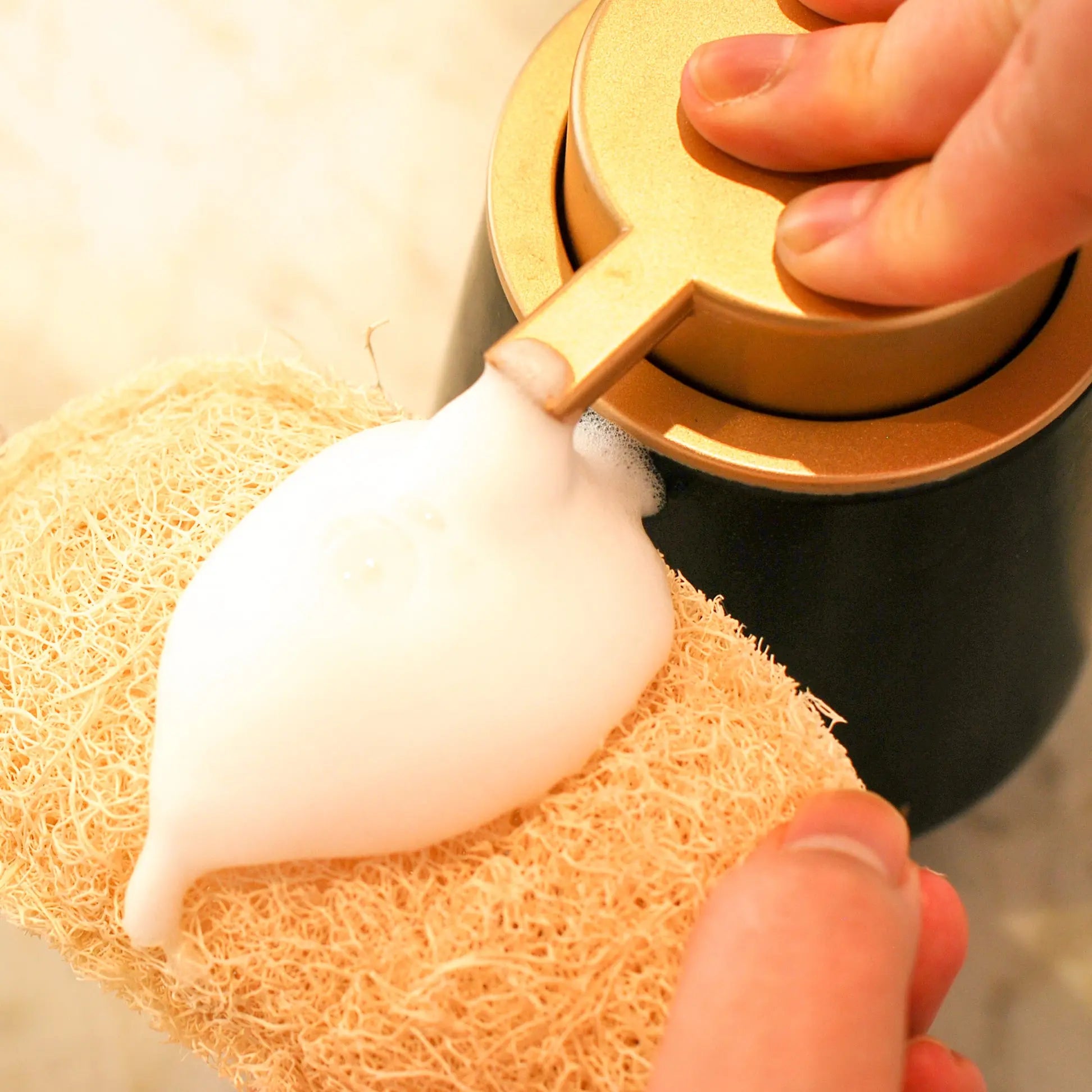 Foam on natural loofah sponge to clean your dishes